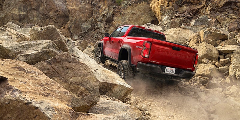 2024 Chevrolet Colorado Offroad driving up rocks