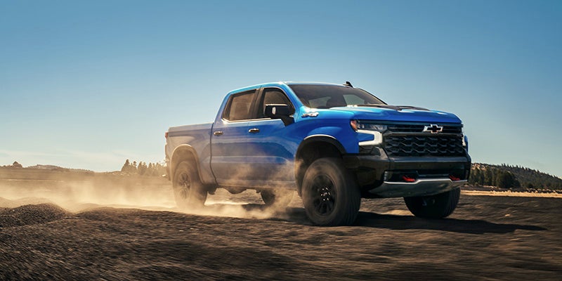2025 Chevrolet Silverado 1500 driving offroad in desert